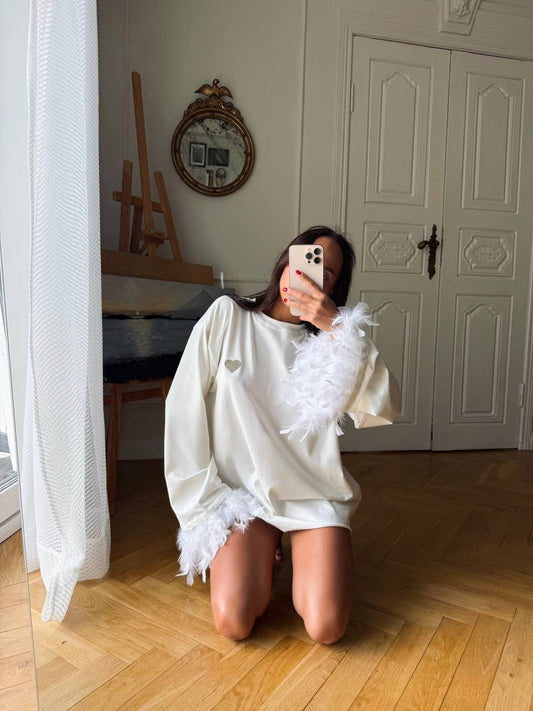 Palaidinė su plunksnomis