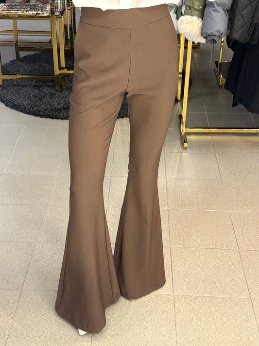 Platėjančios kelnės