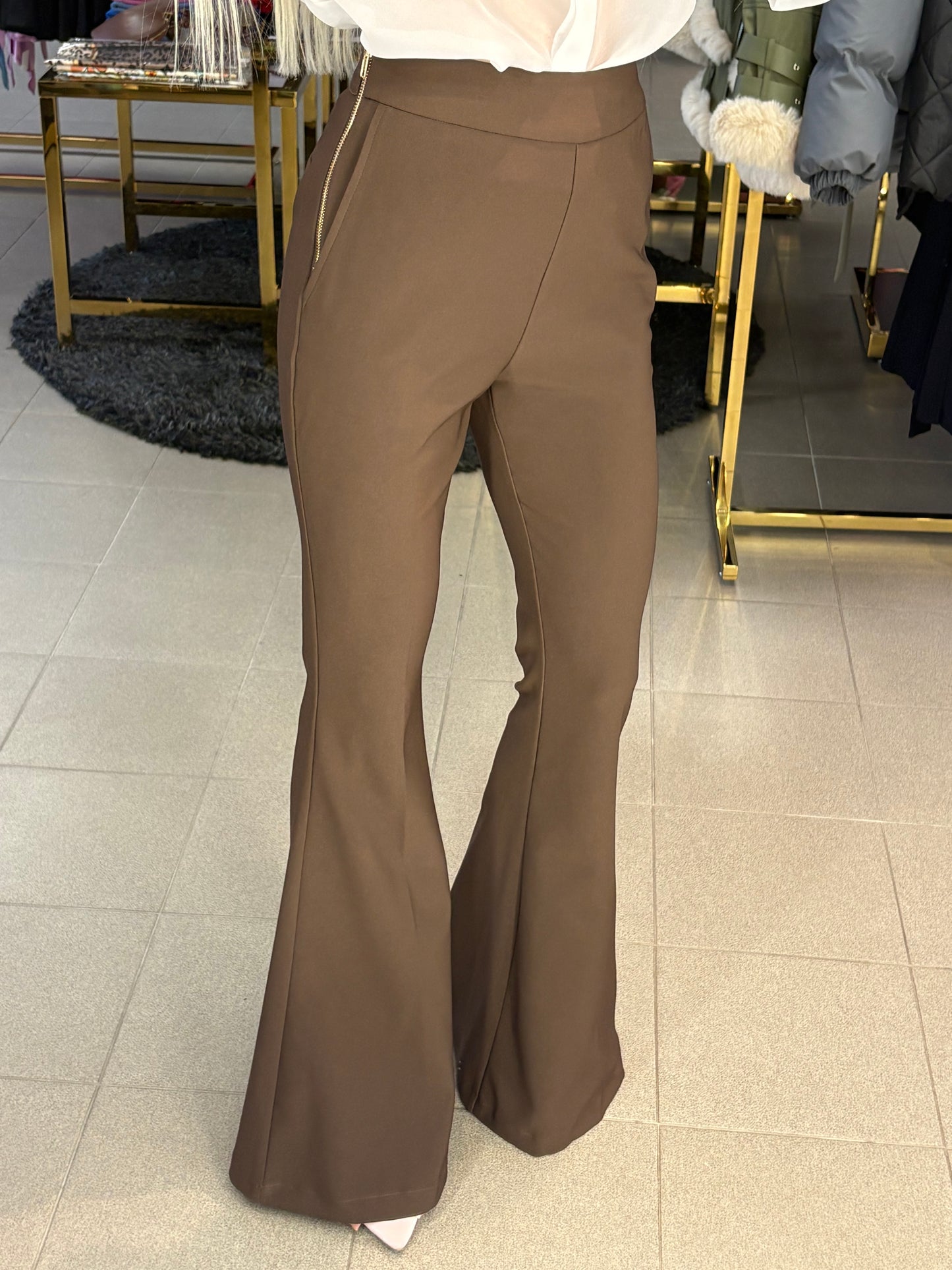 Platėjančios kelnės